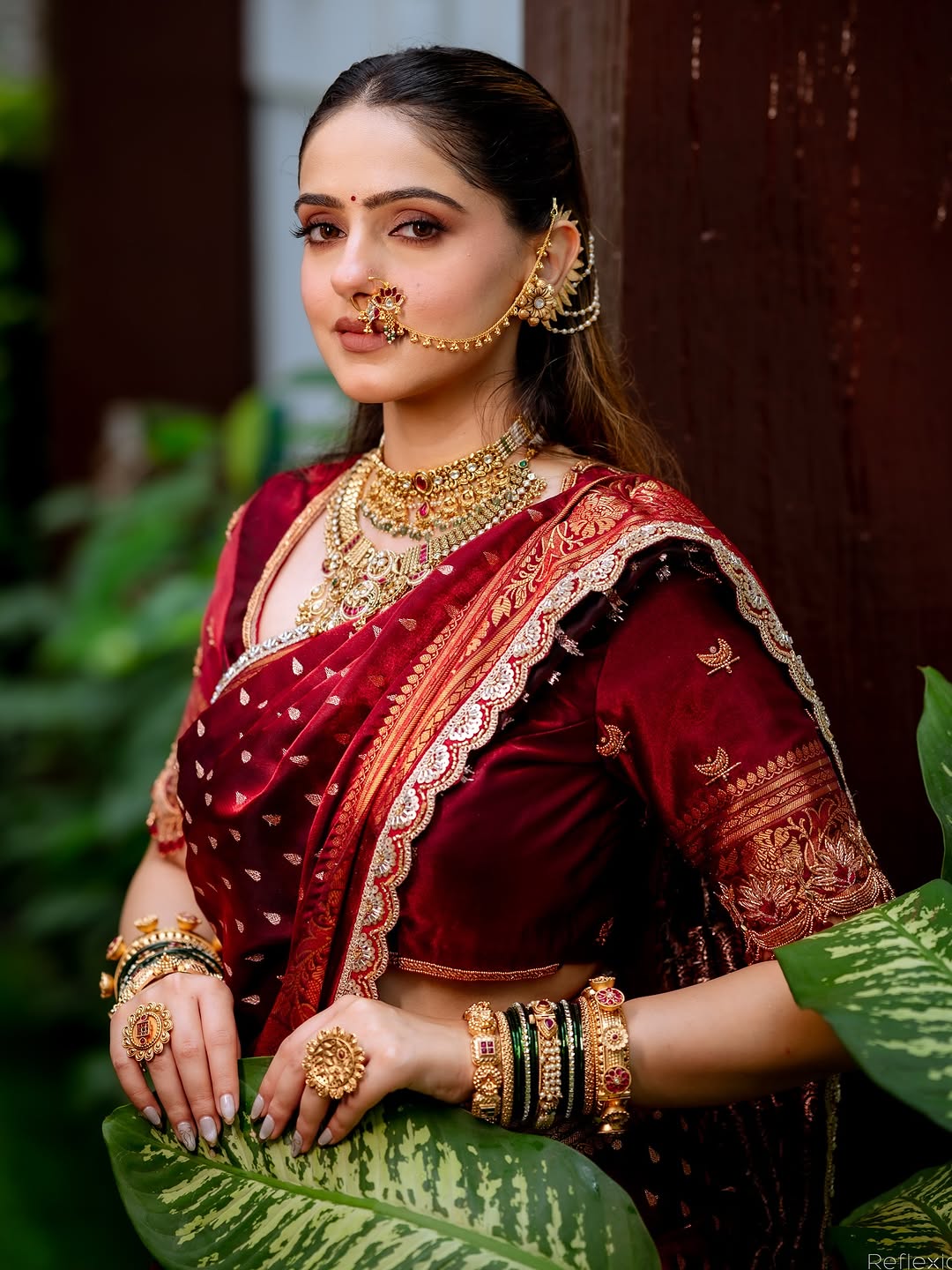 Elegant Woman Applying Lipstick